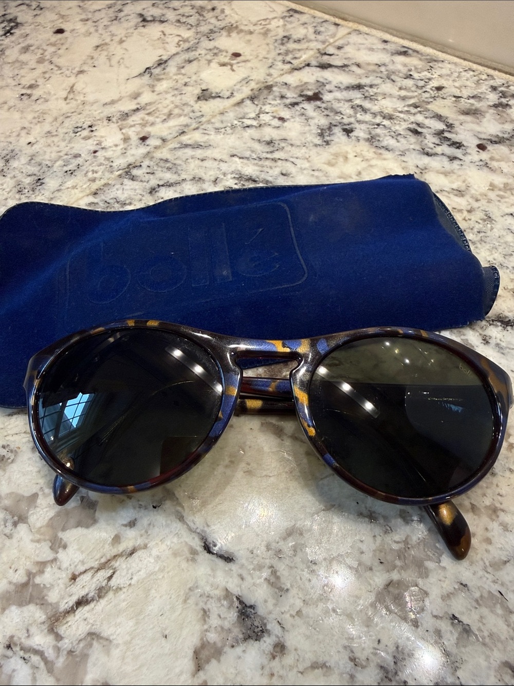 Bolle “Geometric”  Round Tortoiseshell Sunglasses with Blue and Yellow Accents